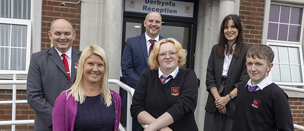 Image of Debi Howell, LIBF with Jeremy Evans, Principality and students and teachers from Coedcae School, Llanelli who are benefitting from Principality's funding""