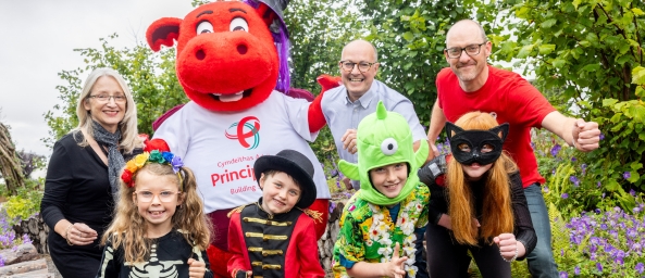 Ty Hafan CEO, Ty Gobaith CEO with Dylan the Dragon, James Harper and Friends
