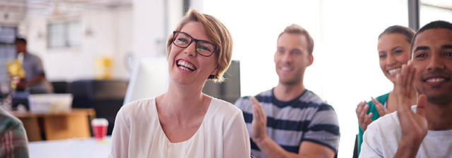 People laughing in a meeting
