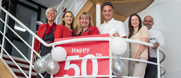 Bridgend colleagues pose with Chief Executive for branch 50th birthday