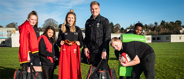Wales rugby star hand delivers kit donation to local charity