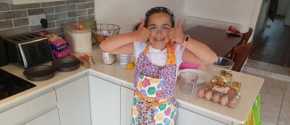 Indi baking and giving you the thumbs up