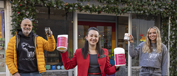 Image of a colleague from Principality with Jeff Smith and Chloe Smith, Co-founders of Bigmoose