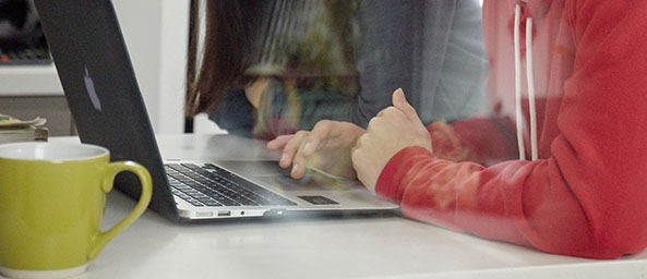 Image showing people typing on a laptop